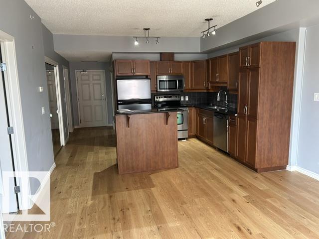 #710 10303 111 ST NW - 13