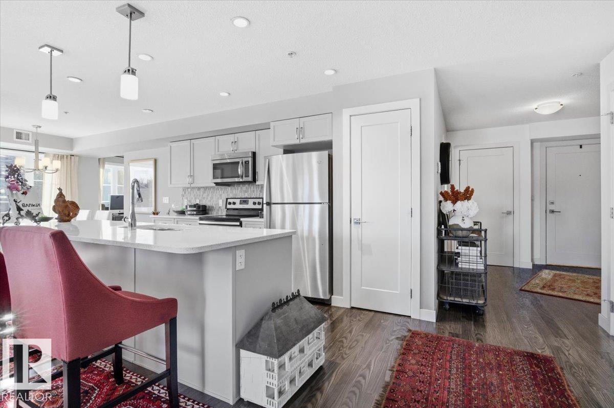 #211 5029 EDGEMONT BV NW - 6