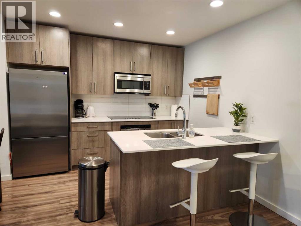 #303 1629 38 Street SW - 4