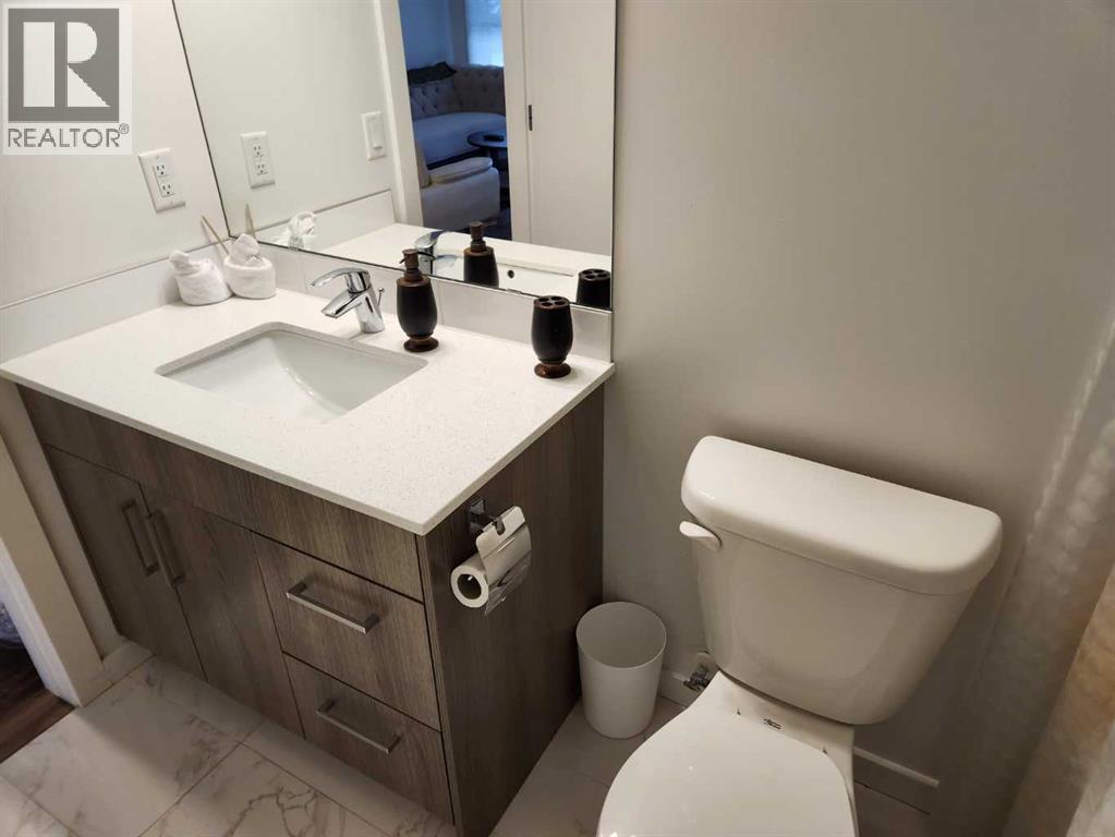 #303 1629 38 Street SW - 16