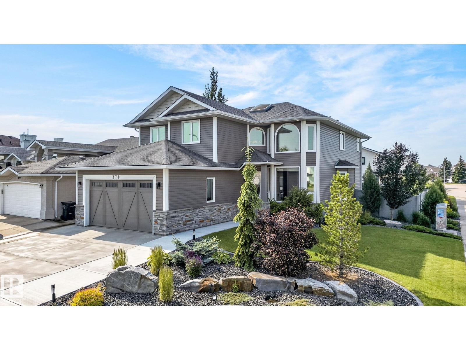 370 HOLLICK-KENYON RD NW - 1
