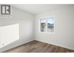 Living room - 1150 Poley Street N, Regina, SK S4X0K2 Photo 12