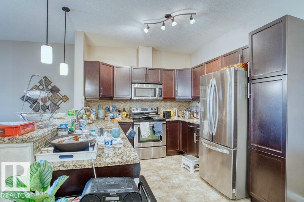 #319 6083 MAYNARD WY NW - 6