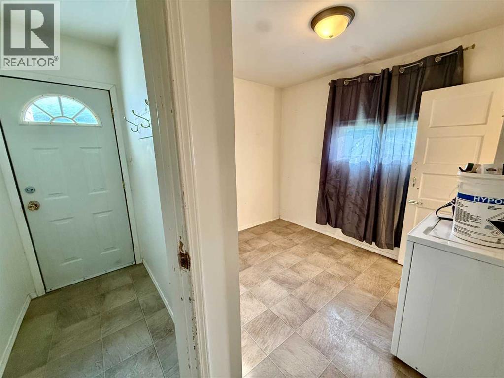 Side Door / Bedroom 2 & Laundry