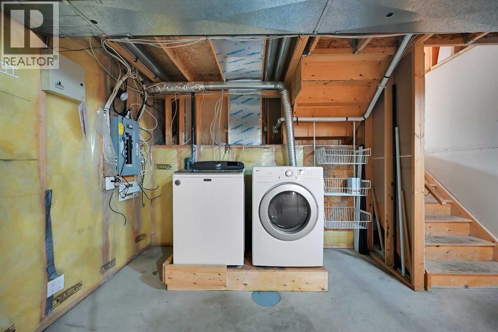 The LAUNDRY area is in the UNFINISHED lowest floor of this 4 level Split home.  Room for a folding table  or CRAFT space as well