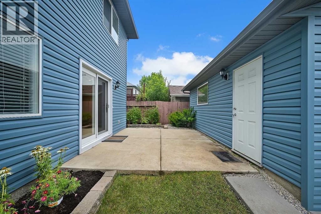 The backyard PATIO space is perfect for the BBQ and enjoying the warm WEST sunshine
