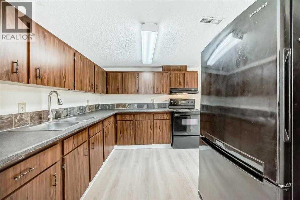 #702 1540 29 Street NW - 5