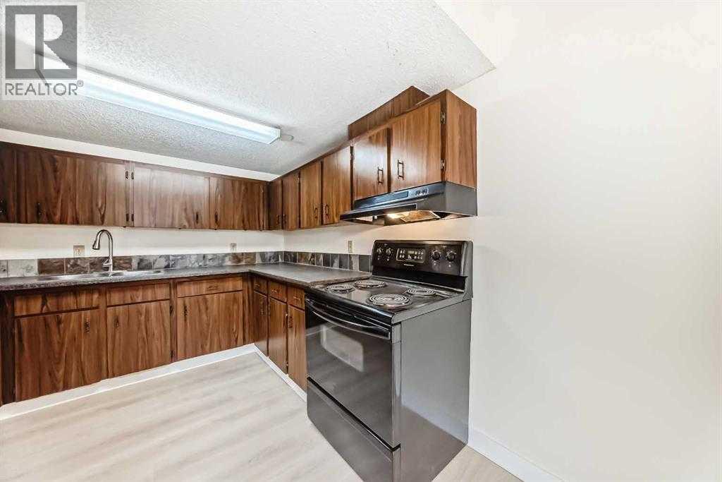 #702 1540 29 Street NW - 4