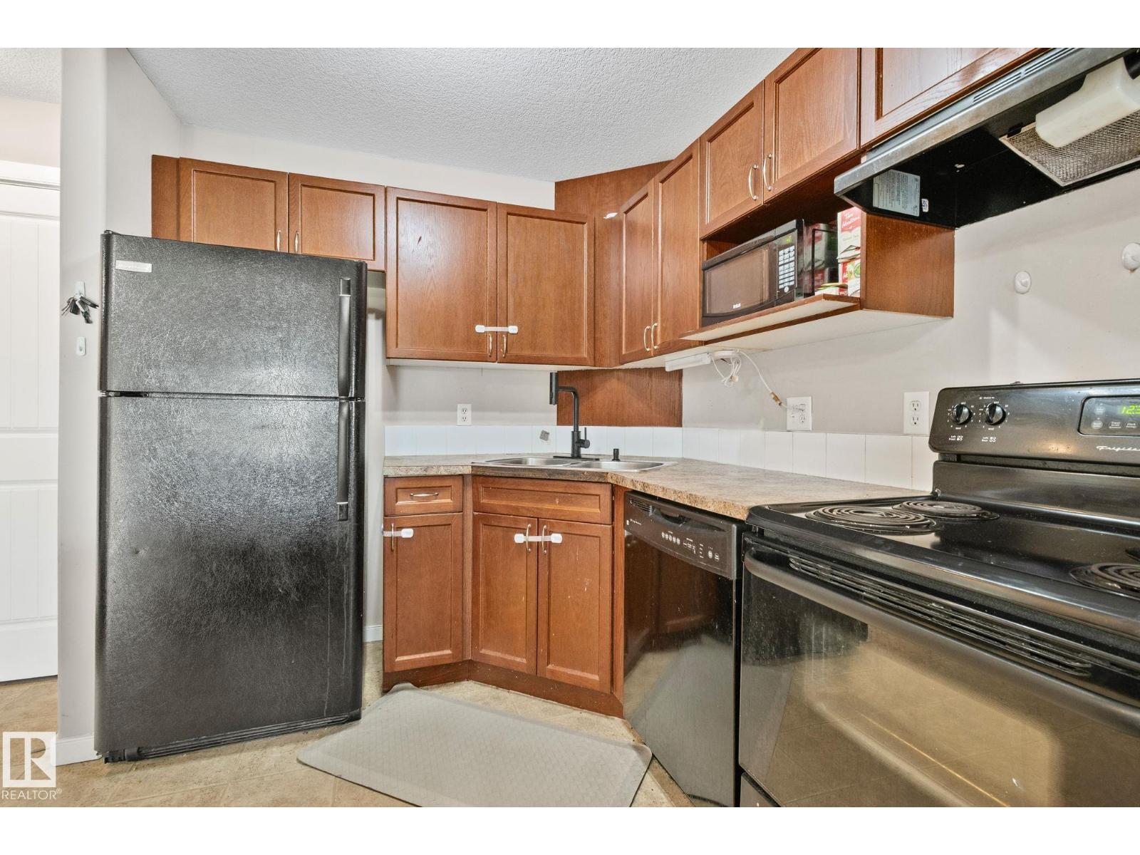 #209 240 SPRUCE RIDGE RD - 11
