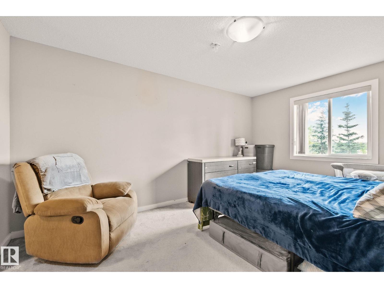 #209 240 SPRUCE RIDGE RD - 18