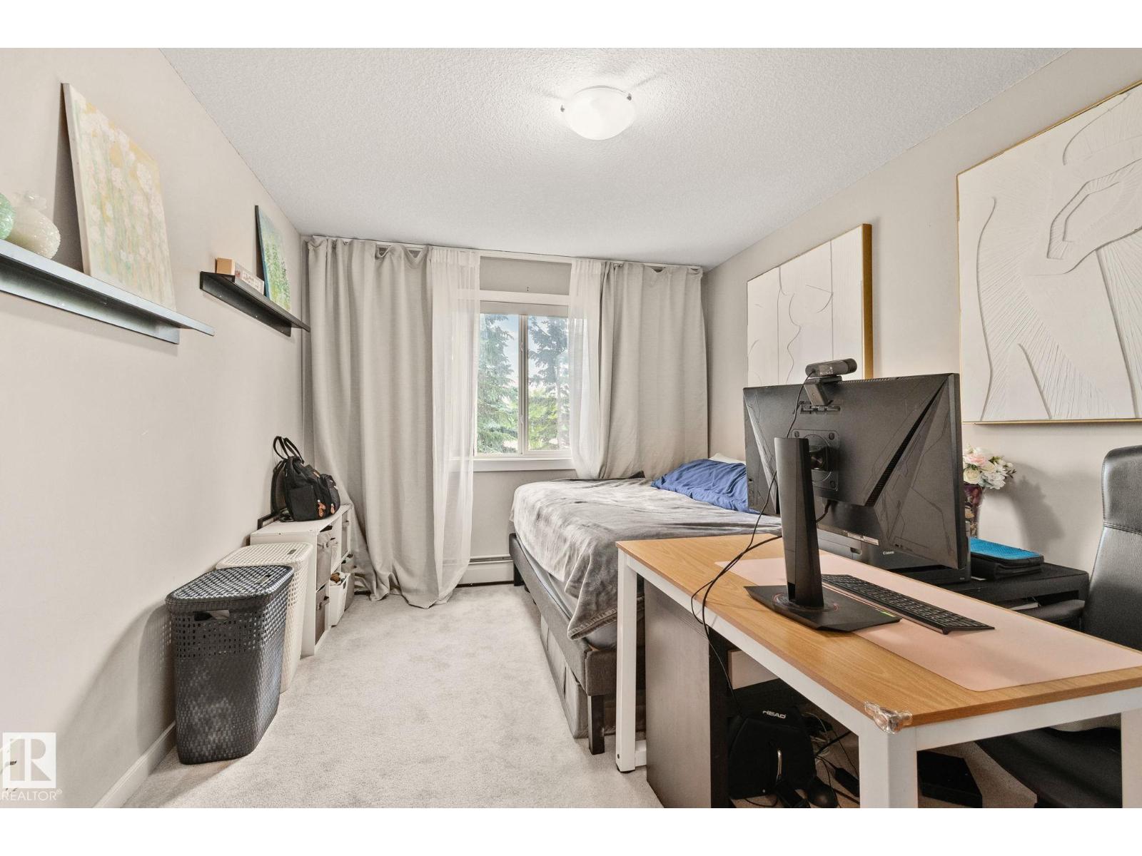 #209 240 SPRUCE RIDGE RD - 24