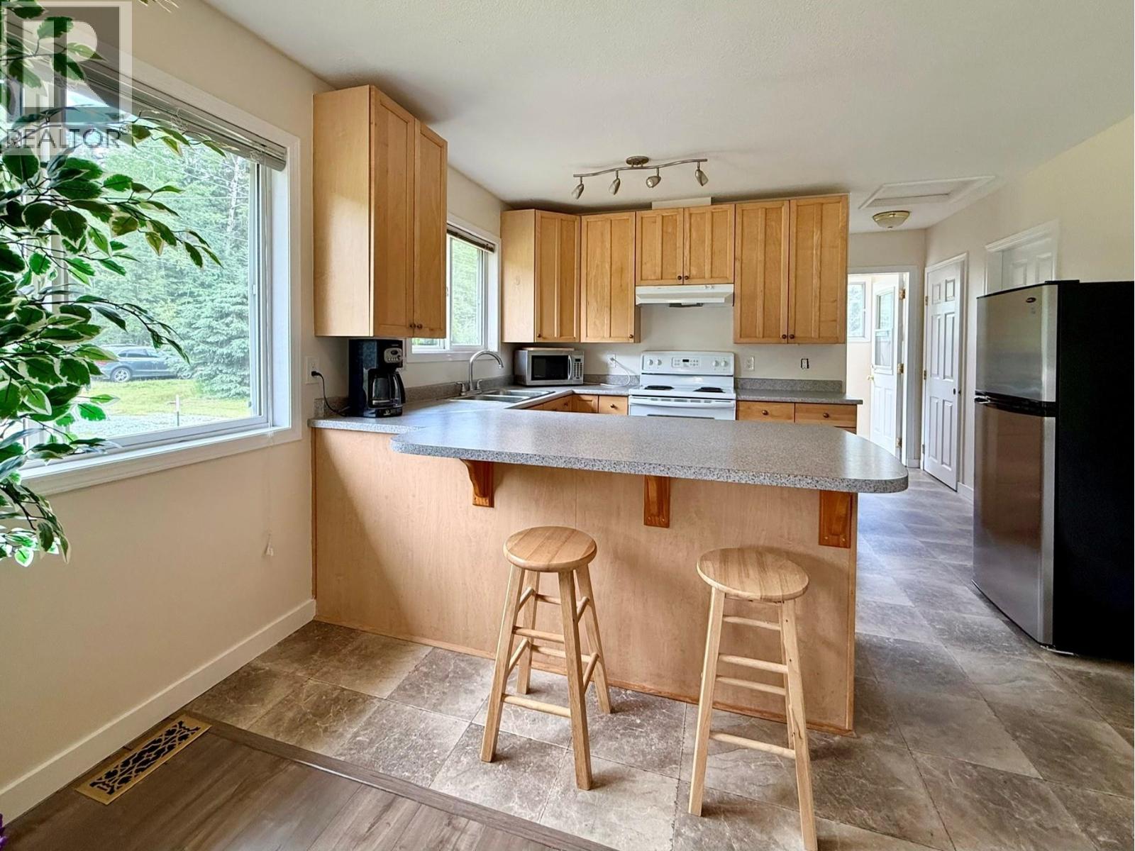 Photo 12 of 28 — 7280 OTWAY ROAD · Prince George, BC