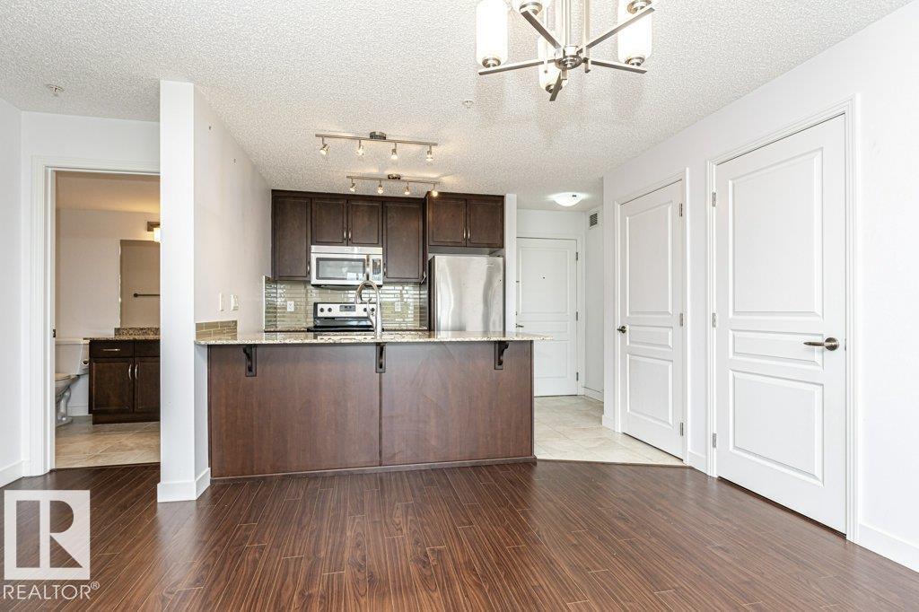 #207 7021 SOUTH TERWILLEGAR DR NW - 14