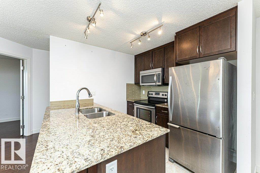 #207 7021 SOUTH TERWILLEGAR DR NW - 17
