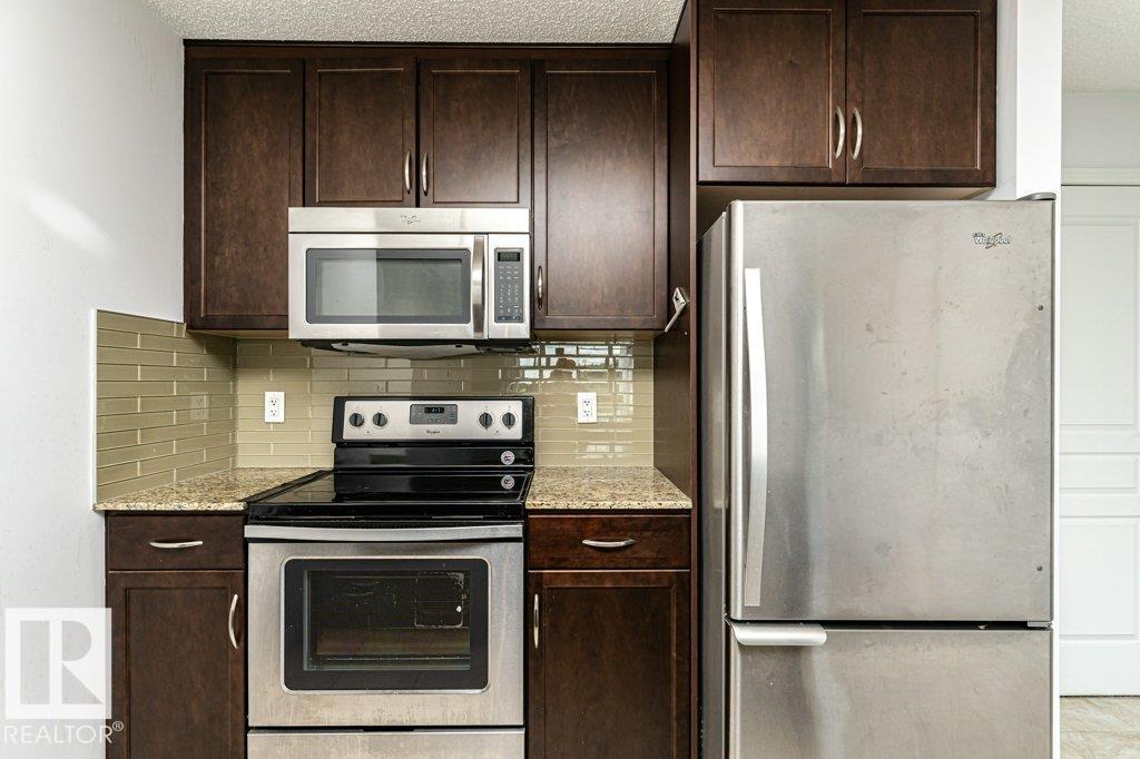 #207 7021 SOUTH TERWILLEGAR DR NW - 19