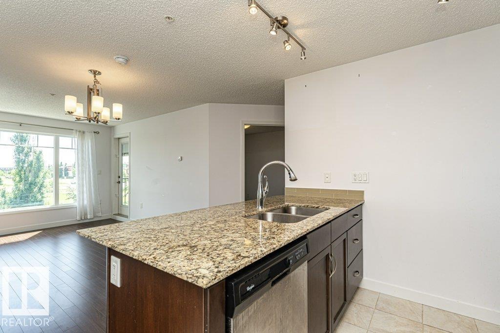 #207 7021 SOUTH TERWILLEGAR DR NW - 20