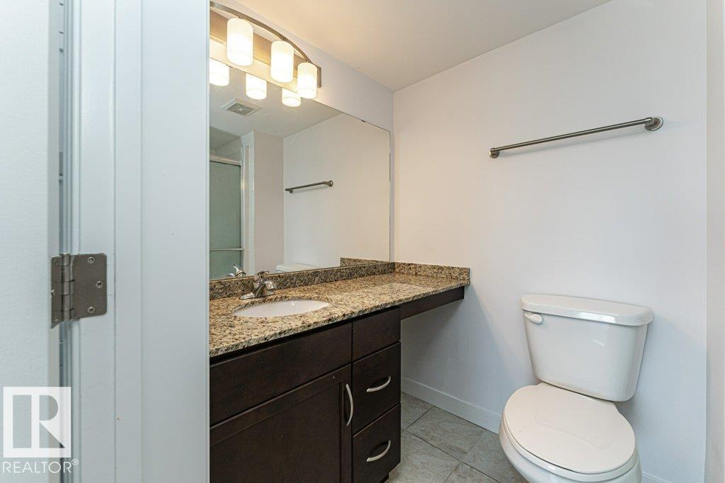 #207 7021 SOUTH TERWILLEGAR DR NW - 34