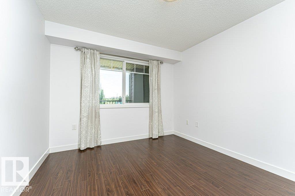#207 7021 SOUTH TERWILLEGAR DR NW - 37
