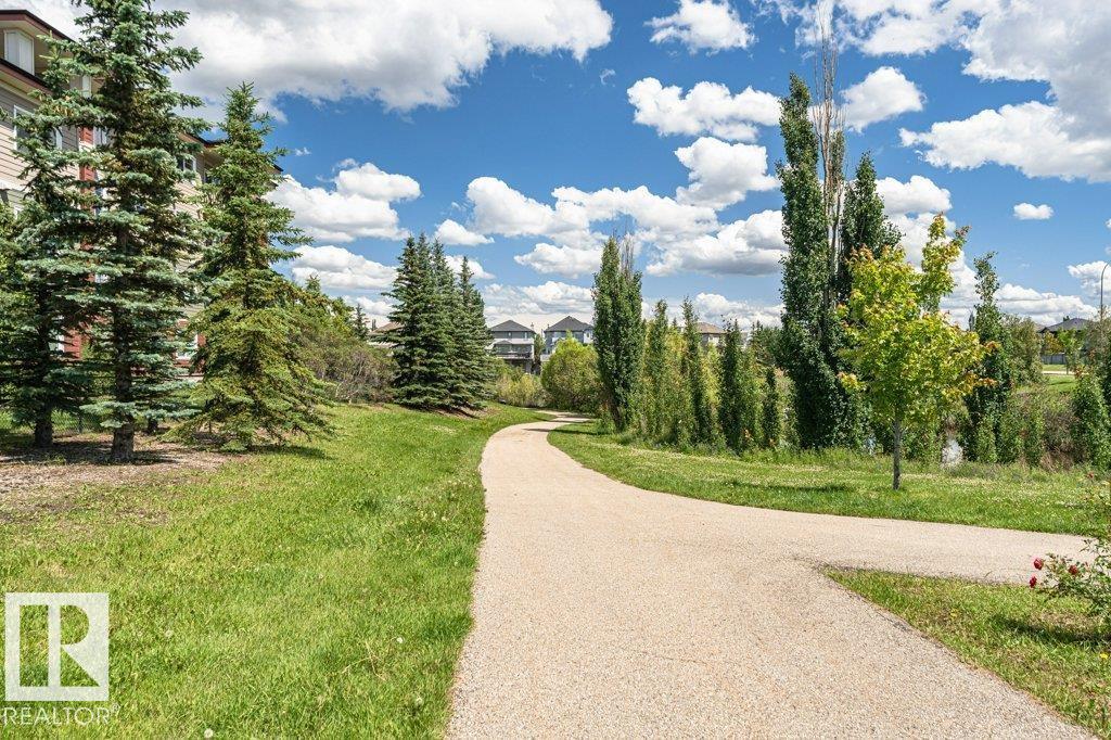 #207 7021 SOUTH TERWILLEGAR DR NW - 50
