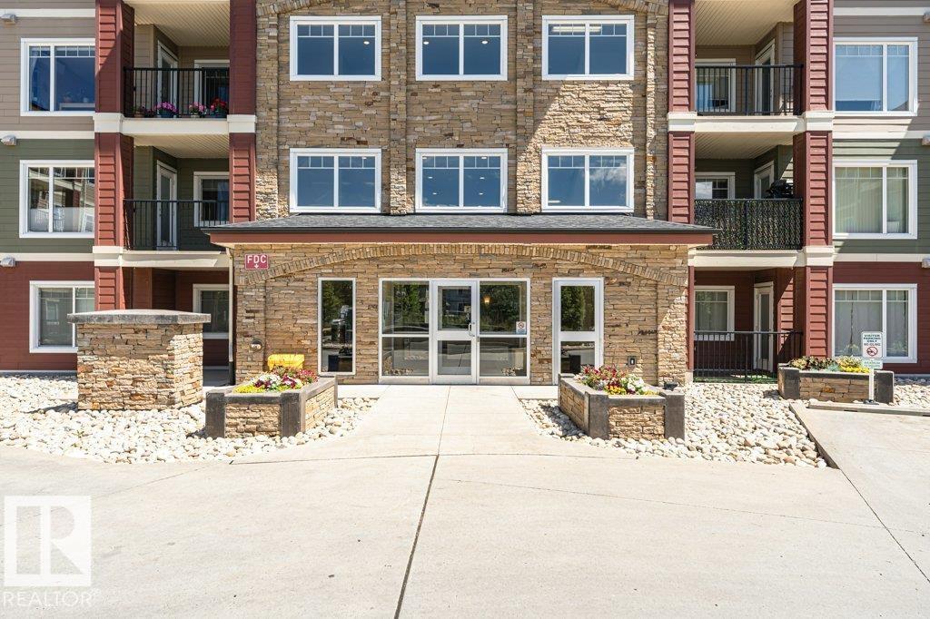 #207 7021 SOUTH TERWILLEGAR DR NW - 7