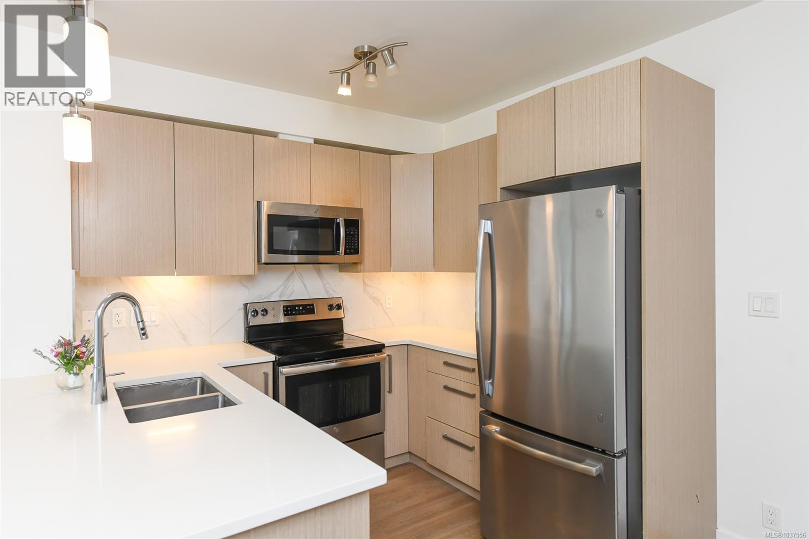 #310 3070 Kilpatrick Ave - 6
