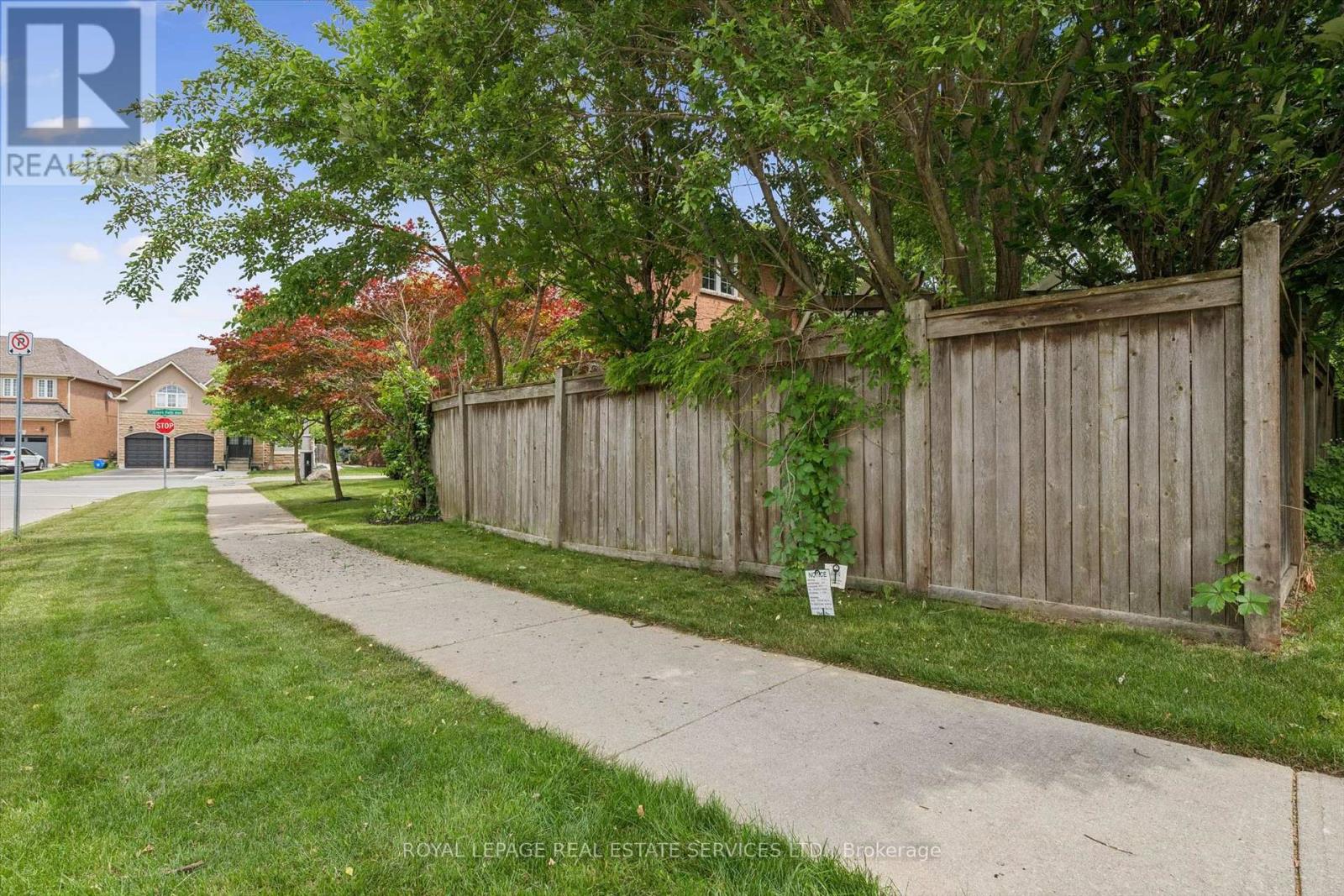Preferred Corner Lot in Coveted Lakeshore Woods!