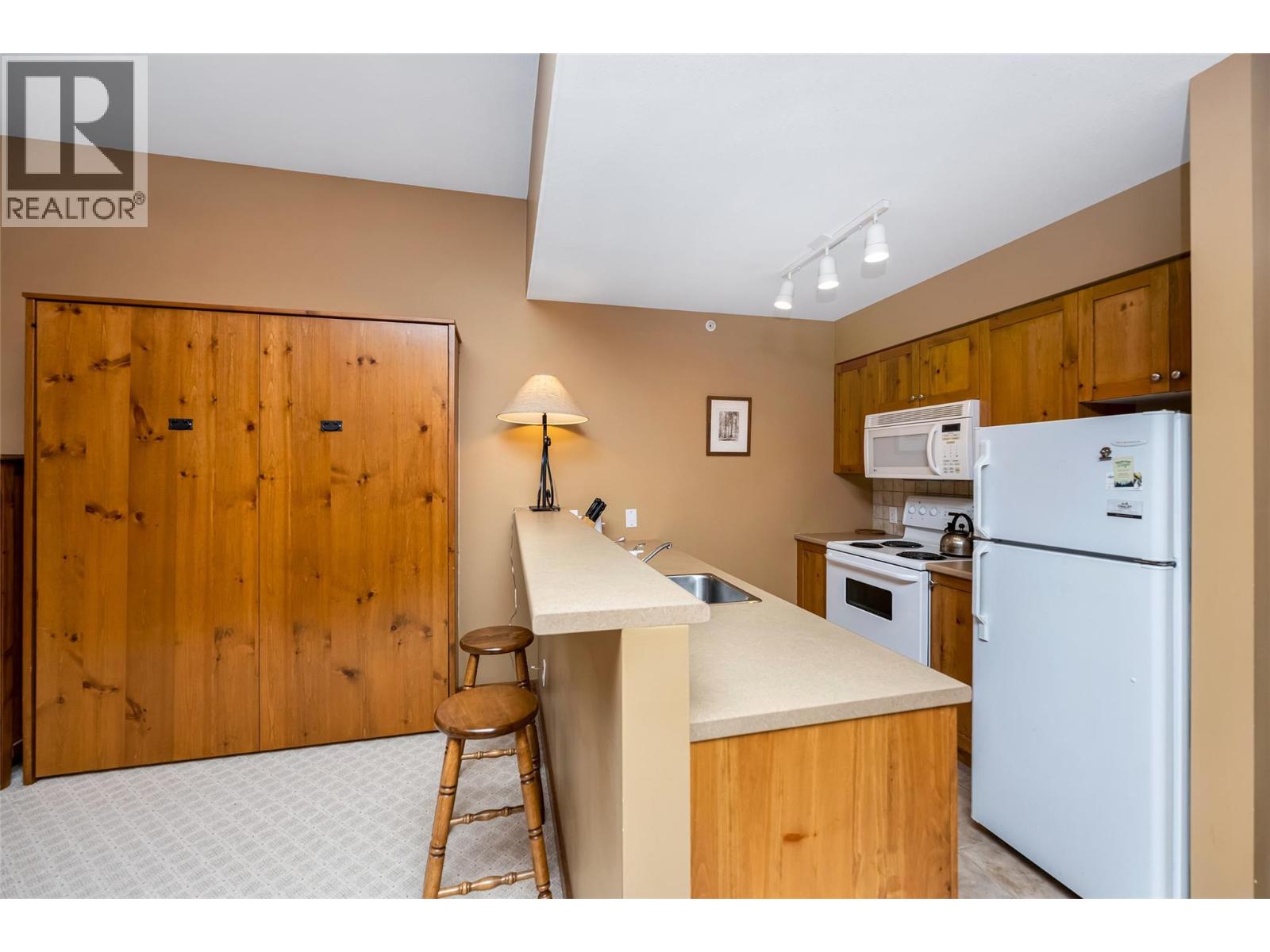 #302 9812 Silver Star Road - 9