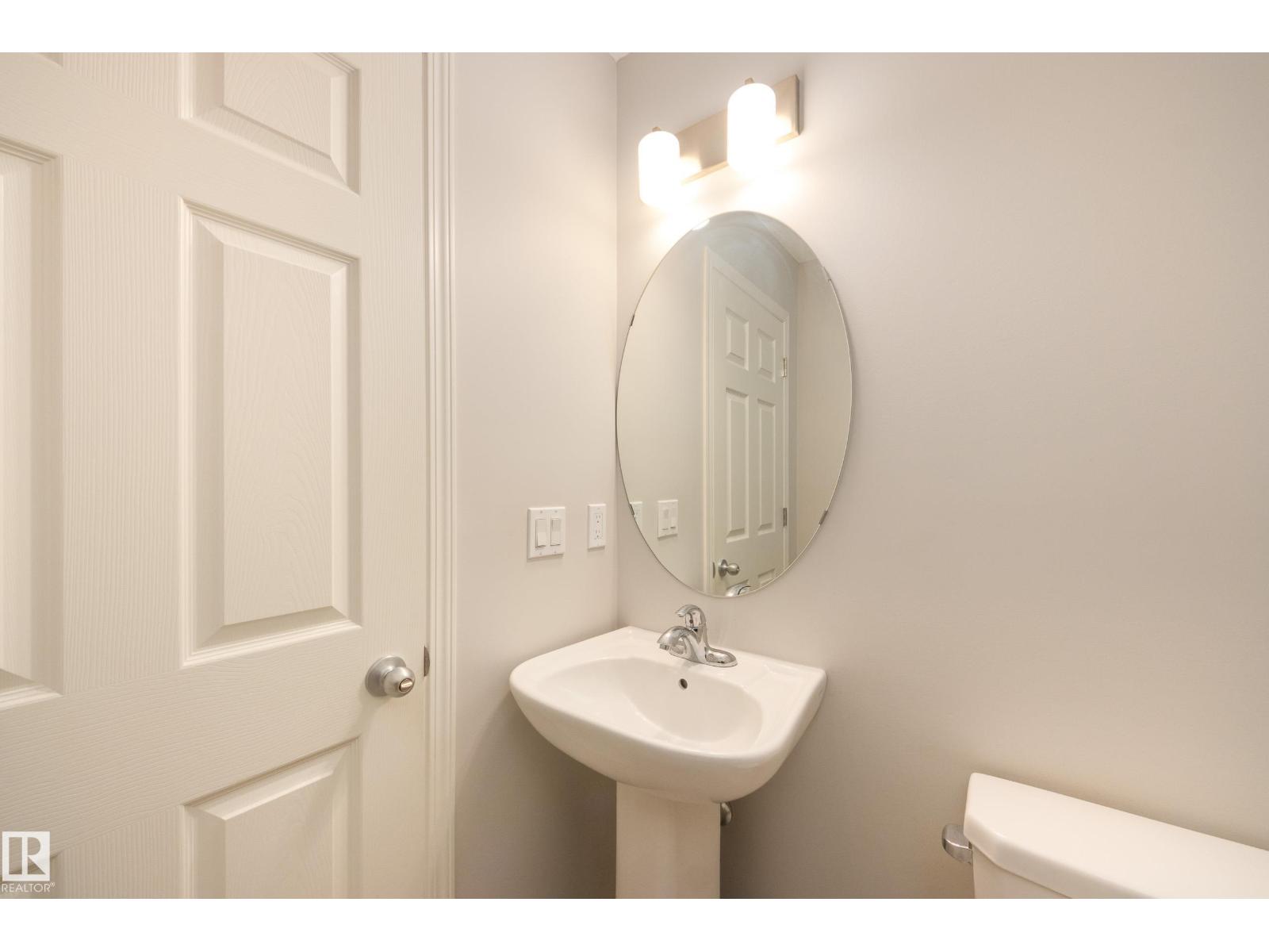 7987 ERASMUS CR NW — photo 16