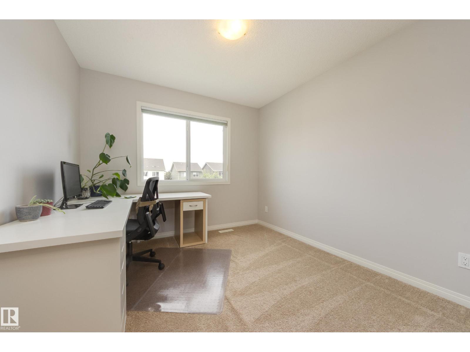 7987 ERASMUS CR NW — photo 22