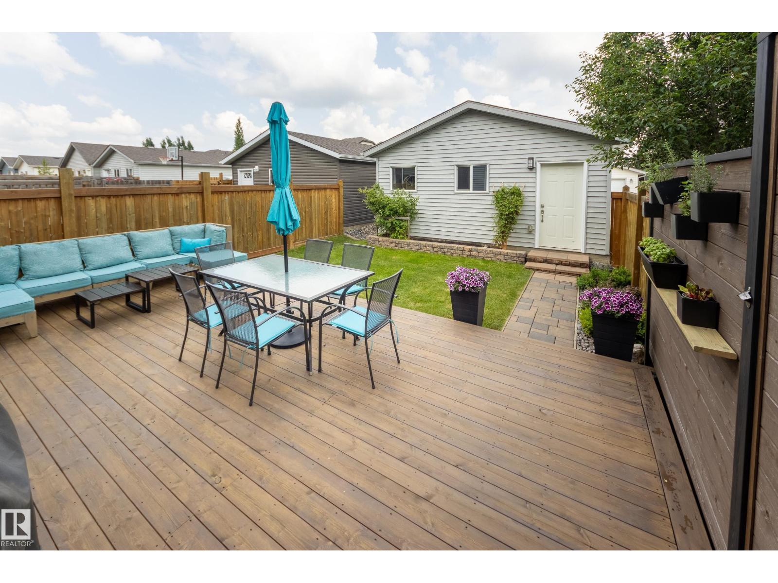 7987 ERASMUS CR NW — photo 29