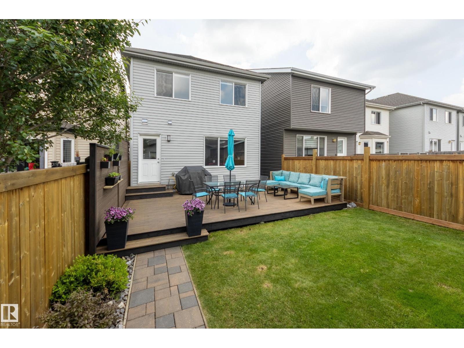 7987 ERASMUS CR NW — photo 32