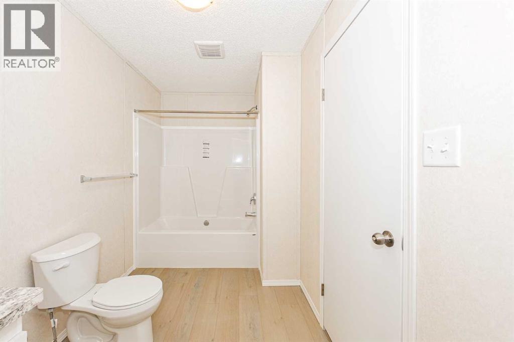 #77, 4802 54 Avenue - 13