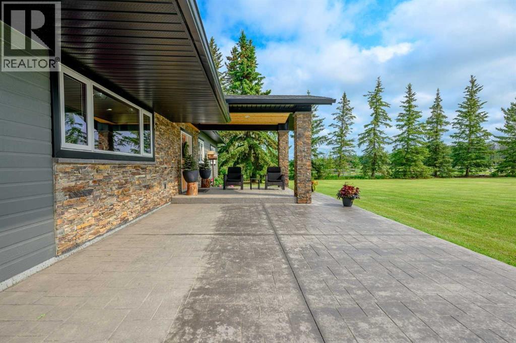 extended stamped concrete front patio with amazing portico!