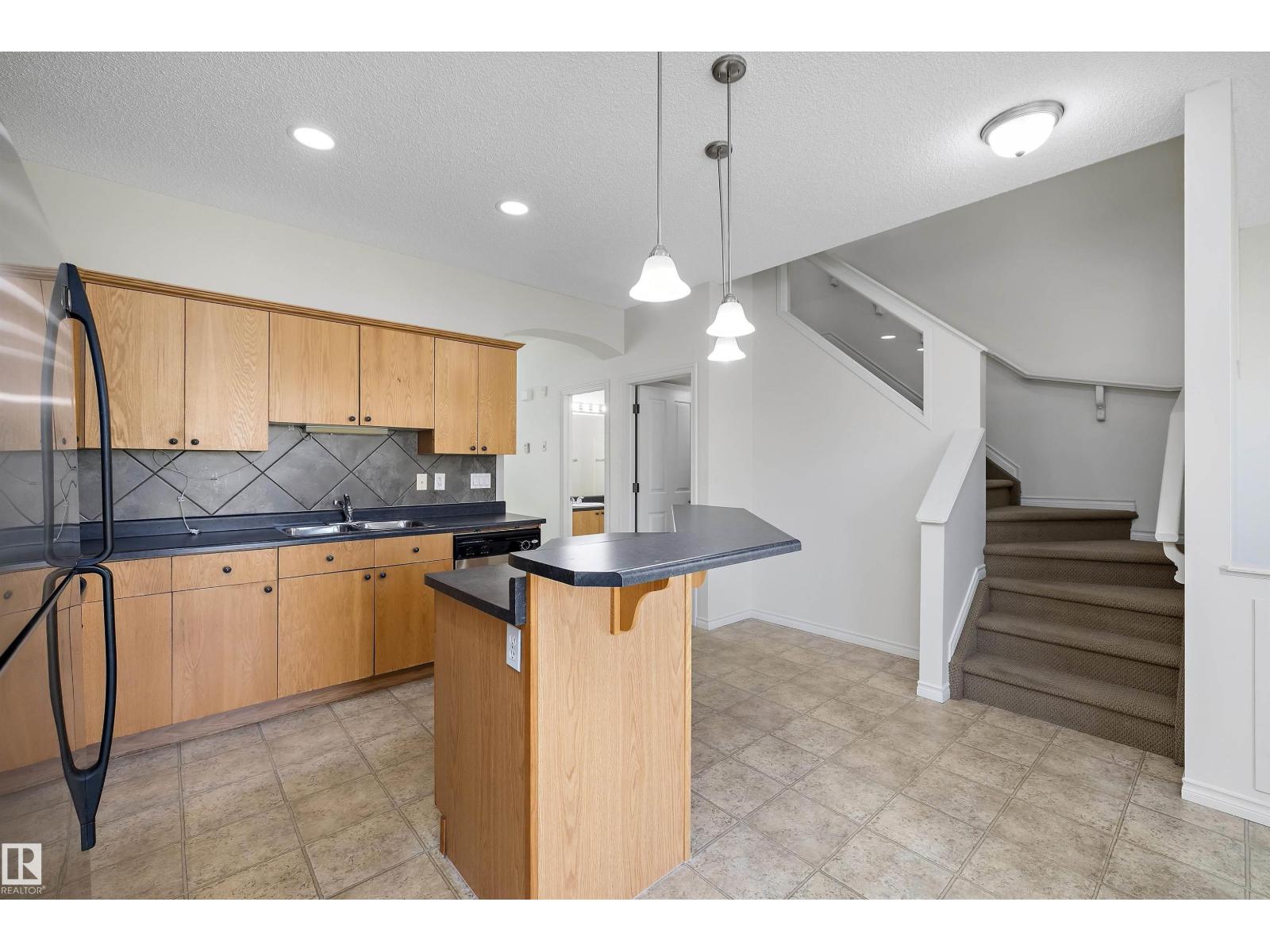 #101 13825 155 AV NW — photo 18