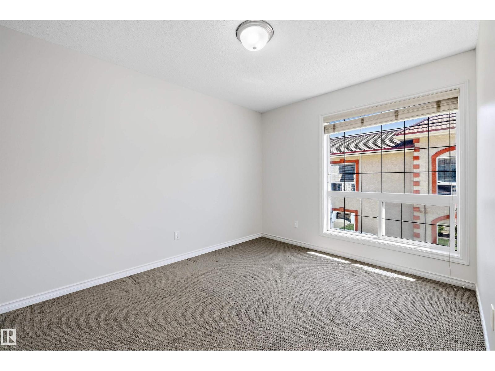#101 13825 155 AV NW — photo 33