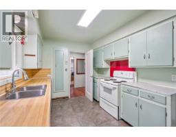 Living room - 4511 Pachena Pl, Saanich, BC V8X2P1 Photo 9