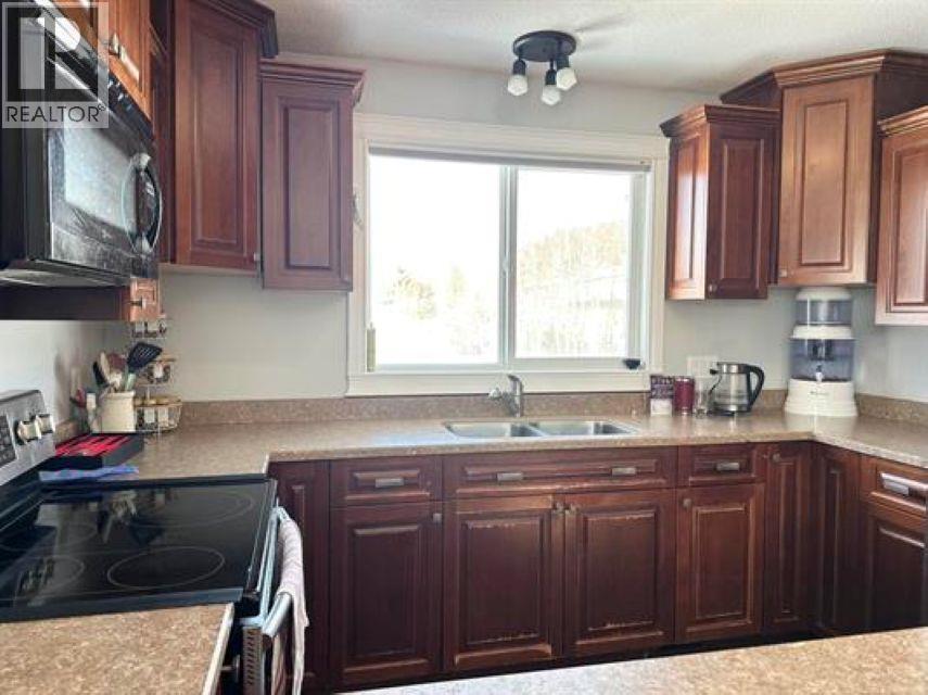 9405 RIVER DRIVE - 8