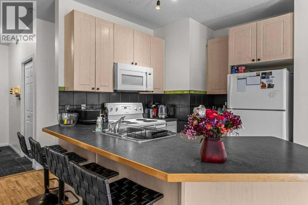 #211 176 Kananaskis Way - 9