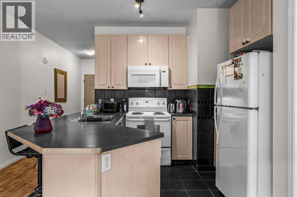 #211 176 Kananaskis Way - 10