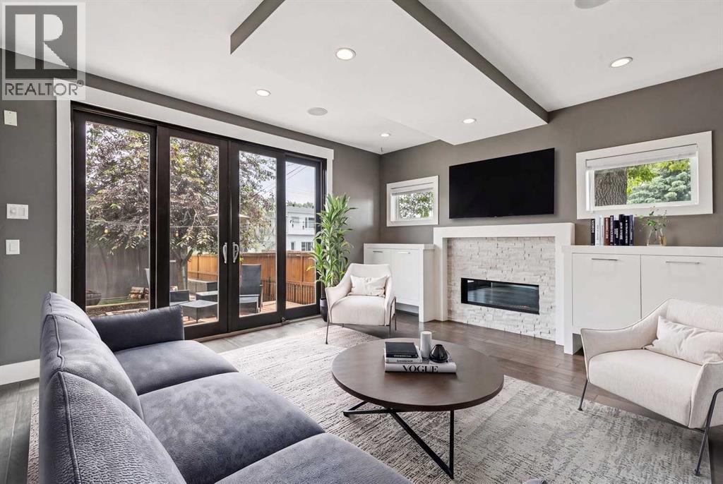 Virtually Staged - Living Room with Floor to Ceililng Patio Doors extending your indoor/outdoor entertaining