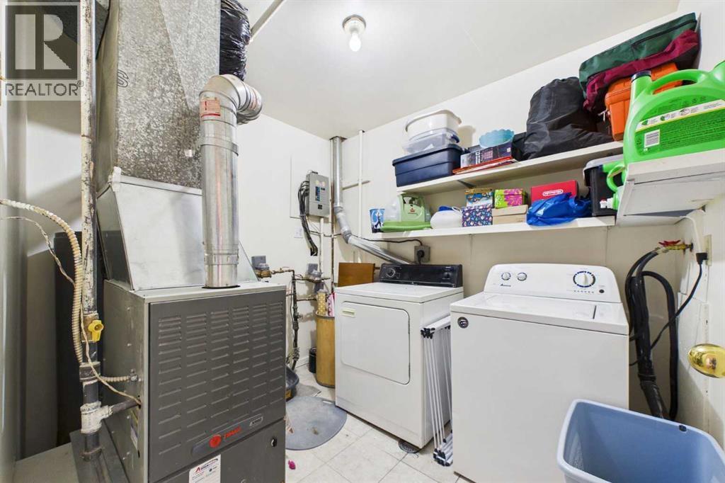 Utility, Mechanical & Laundry Room: 8'10" x 7'8", Trane Ener-guide 80.0, Hot Water Tank, Amana Washer, Admiral Dryer, Storage, Tile Floor