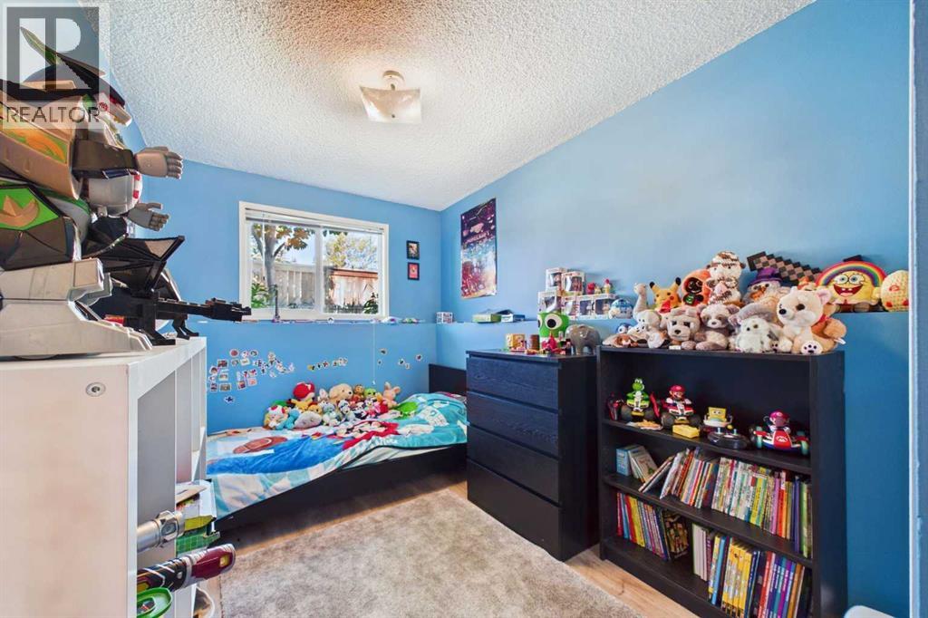Unit D, Bedroom #2, 13' x7'7", Window Faces West, Mirrored Closet Doors, Vinyl Window, Venetian Window Covering