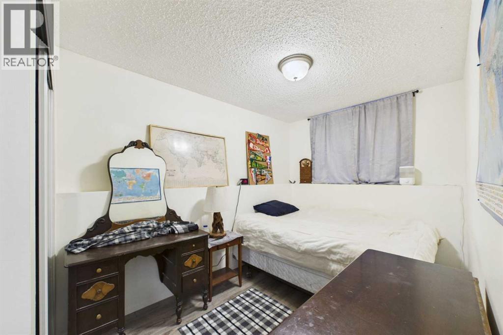 #2 Bedroom, 8'7" x 15'3", South West corner, west window, Mirrored Closet Doors, Luxury vinyl plank, curtains