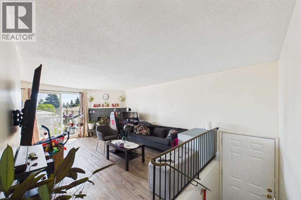 Living Room 12'4" x 21'10", East facing Vinyl Sliding Patio Doors,