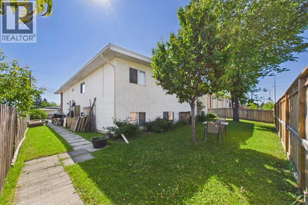 NW Corner, Peonies, 2 trees, Front fence built 2019