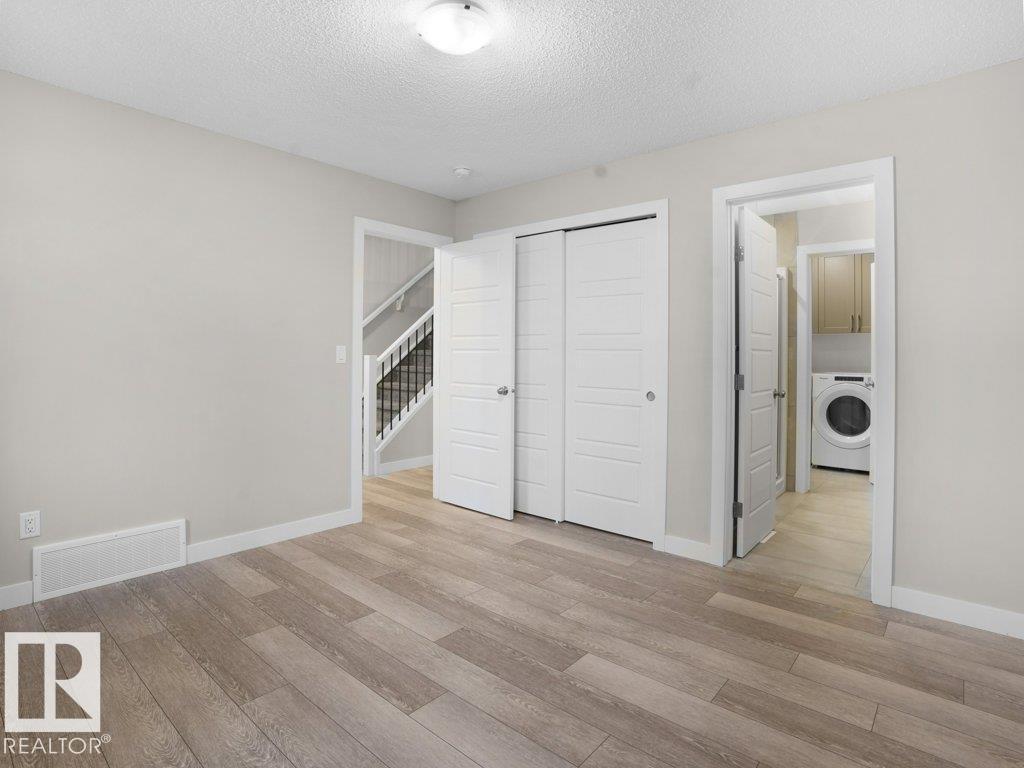 20329 15A AV NW - 15