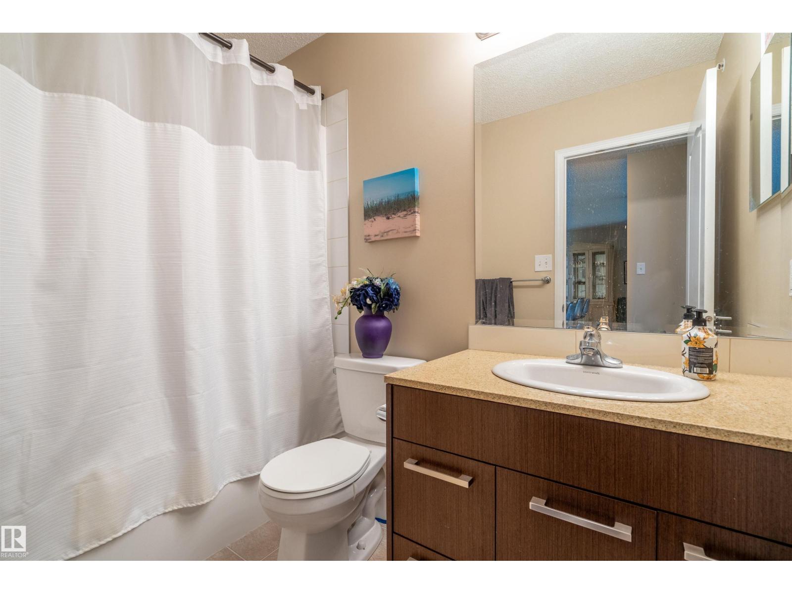 #2401 7343 SOUTH TERWILLEGAR DR NW - 26