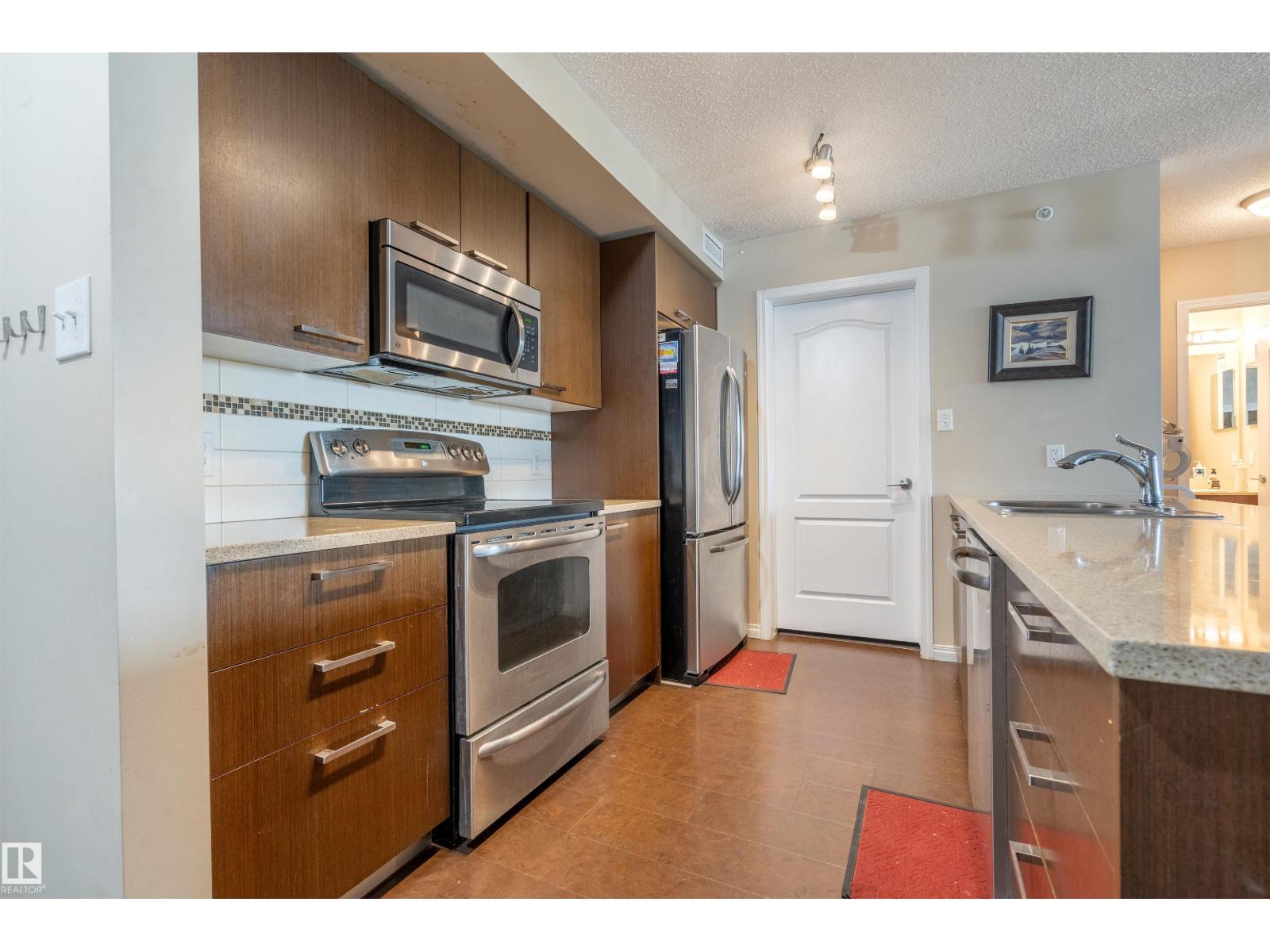#2401 7343 SOUTH TERWILLEGAR DR NW - 4