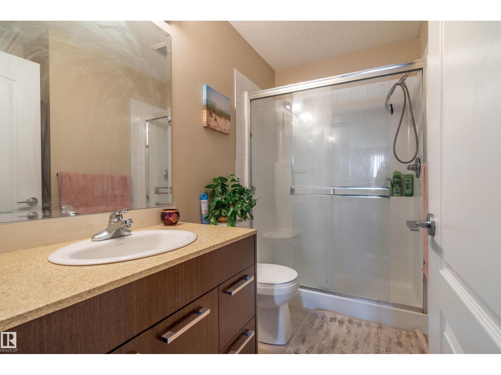 #2401 7343 SOUTH TERWILLEGAR DR NW - 22