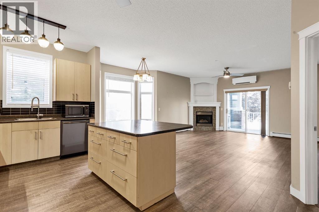 Extra storage in the Island that is set back for ease of use. View to the Living Room as well